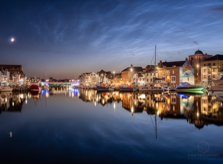 rare noctilucent clouds above weymouth harbour in dorset
